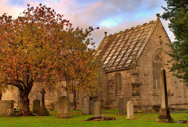 istock Small church in autumn scene 1438171912