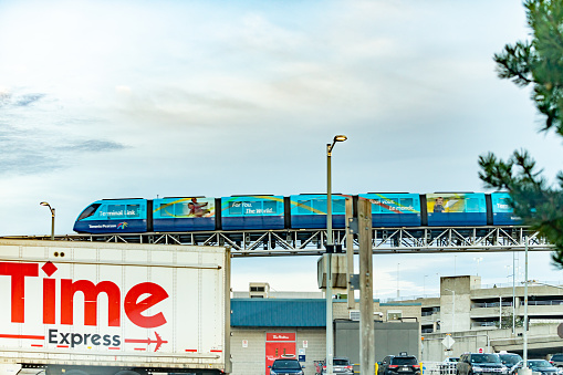 A Light rail running at Pearson International airport at dusk, Toronto, Canada.