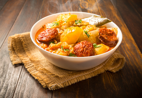 Stewed cabbage with sausage and potatoes