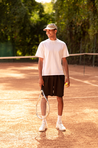 Tennis player. Young male tennis player at the tennis court
