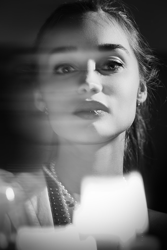 beautiful woman portrait with blurred effect, monochrome