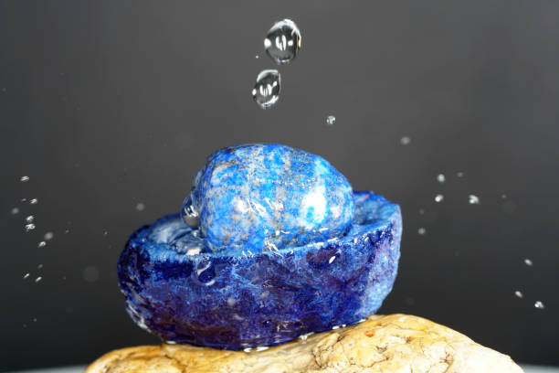 istock Quartz with mineral crystals against a black background 1438175634