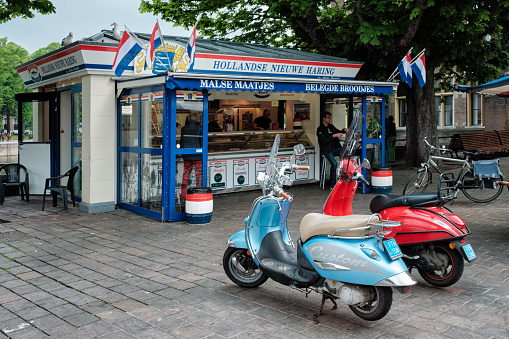 The Hague, Netherlands - May 13, 2017 - Hollandse Nieuwe soused herring stall in the Hague, the Netherlands. Hollandse Nieuwe soused herring is the famous traditional food