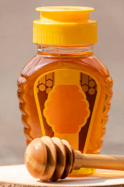 istock honey in a plastic bottle with a blur background 1438175696