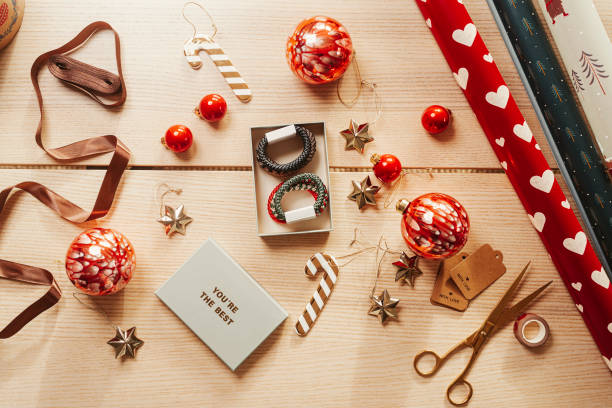 istock christmas gift backgrounds still life from above overhead 1438175887