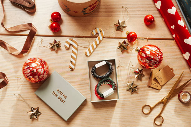 istock christmas gift backgrounds still life from above overhead 1438175959