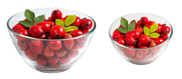 Fresh red Rose Hips in the glass bowl, fresh Berries from the dog rose.
