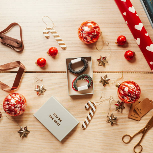 istock christmas gift backgrounds still life from above overhead 1438177557