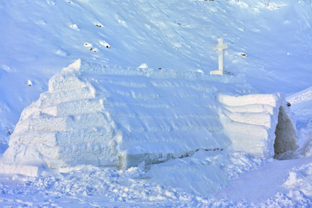 Ice Church at Lake Balea in the Fagaras Mountains in Romania The Ice Church at Lake Balea in the Fagaras Mountains in Romania balea lake romania stock pictures, royalty-free photos & images