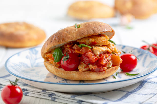 istock Homemade bun stuffed with chicken and vegetables. 1438178326
