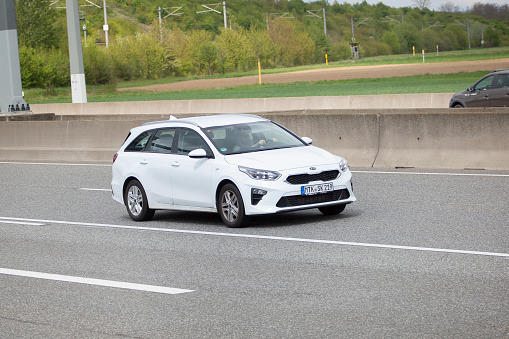 Diedenbergen, Germany - May 06, 2021: A Kia CEED station wagon on a highway nearby Wiesbaden, Germany. The Kia Ceed is a compact car manufactured by Kia. Kia Motors Company is South Koreas second-largest car manufacturer - founded in 1957 and based in Seoul, South Korea.