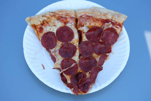 istock Slice of pepperoni 1438180890