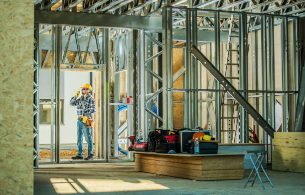 istock Contractor Talking Via CB Radio Inside the Building Under Construction 1438181946