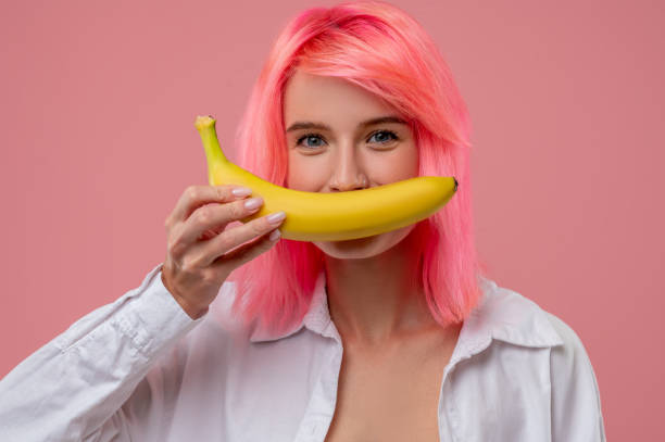 istock Young woman posing with yellow citrus fruit before the camera 1438182067