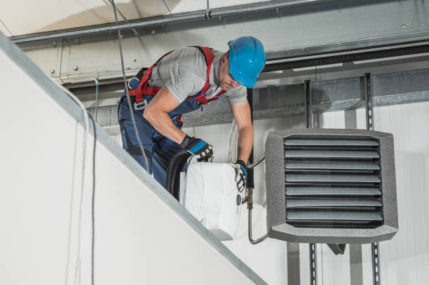 istock HVAC Technician Installing New Warehouse Air and Water Heaters 1438182747