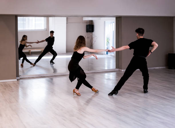 istock Preparing a couple for Latin American dance competition 1438183038