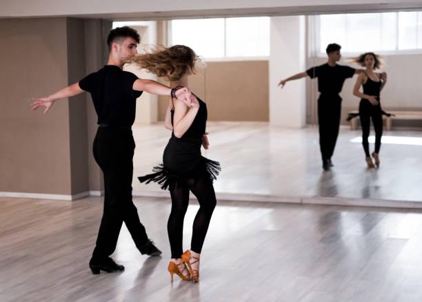 istock Preparing a couple for Latin American dance competition 1438183225
