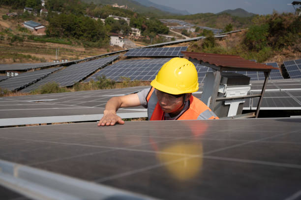 istock Engineer checking solar panels at alternative energy power plant 1438183554