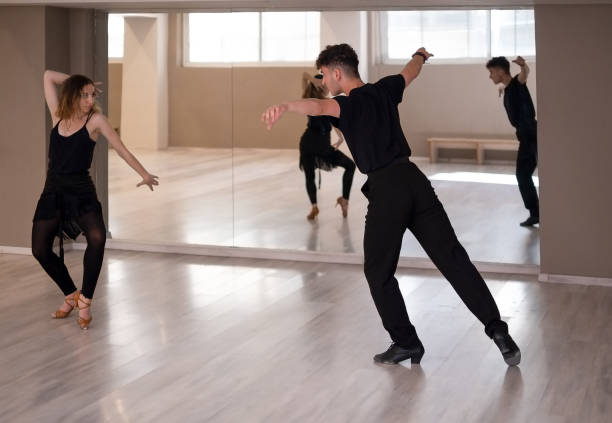istock Preparing a couple for Latin American dance competition 1438183701