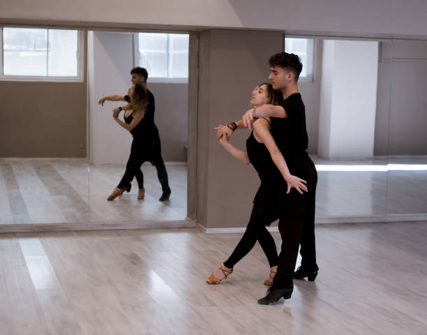 istock Preparing a couple for Latin American dance competition 1438184020