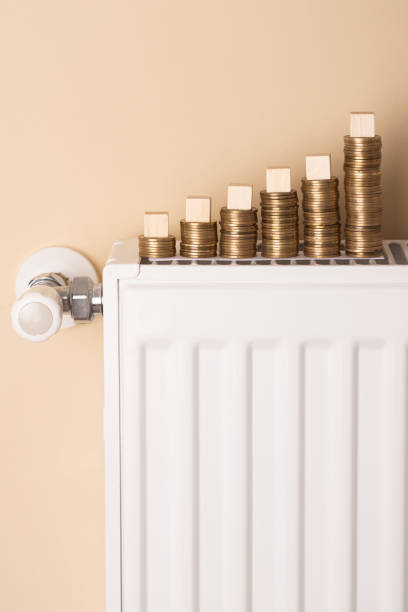 istock Coins and cubes on a radiator 1438184807