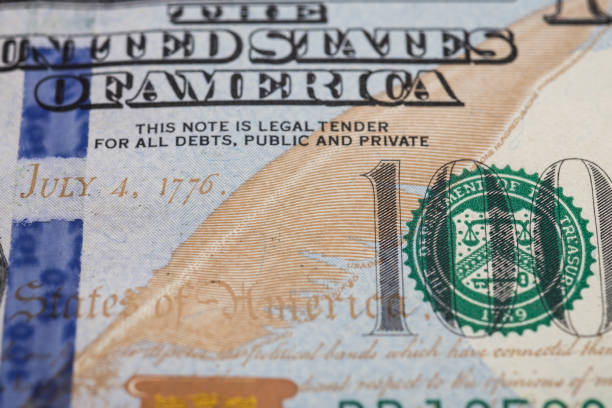 istock One hundred dollars, close-up. With small details. 1438188462