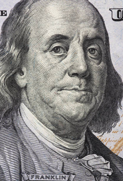 istock One hundred dollars, close-up. With small details. 1438188512