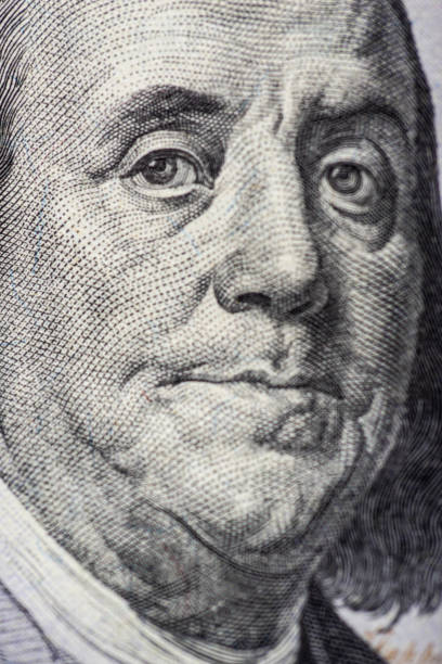 istock One hundred dollars, close-up. With small details. 1438188532