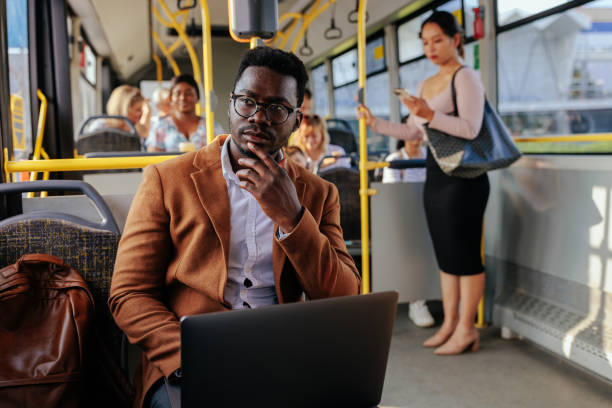 istock African american businessman is working while commuting 1438188553