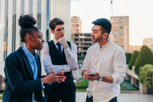 istock Office workers casual talk during lunch break in city 1438189159