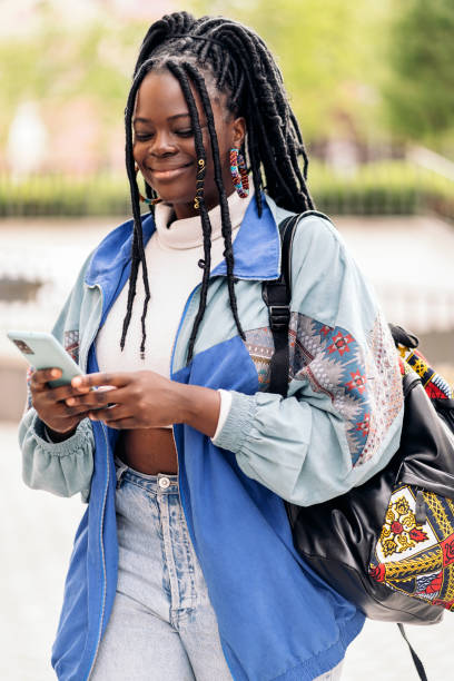 istock African Woman Using Phone 1438190078