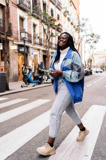 istock Happy African Girl Using Phone 1438190972