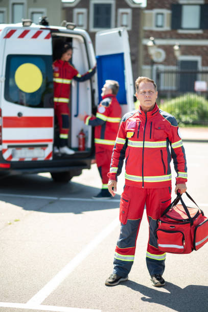 istock Serious ambulance doctor waiting for his work shift outdoors 1438194861