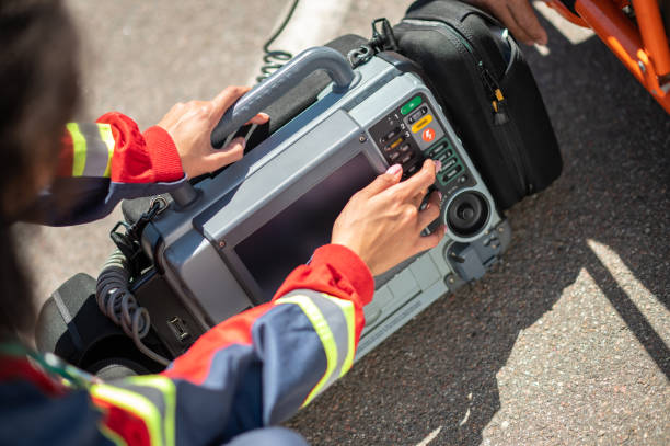 istock Paramedic preparing the ECG device for electrocardiography 1438194954