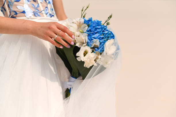 istock Wedding bouquet with white and blue flowers. 1438197483