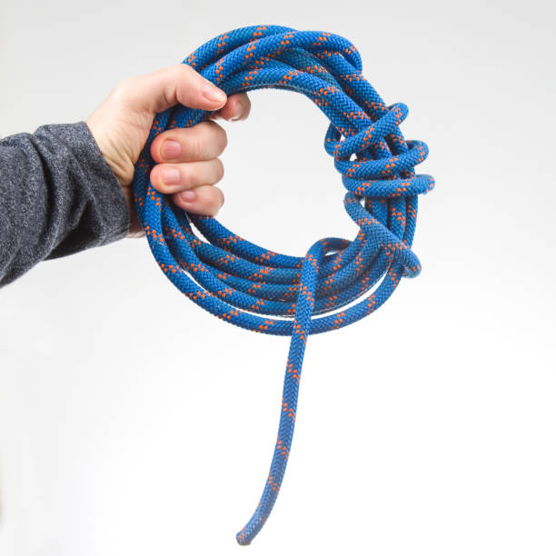 istock hand holds colored rope for climbing equipment. item for camping and climbing 1438199078