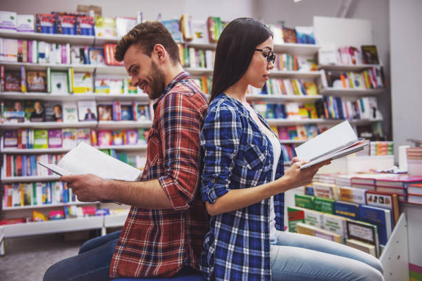 istock Young people at the book shop 1438199498