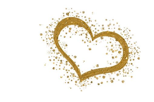 heart and particles of gold as frame on white background, copy space