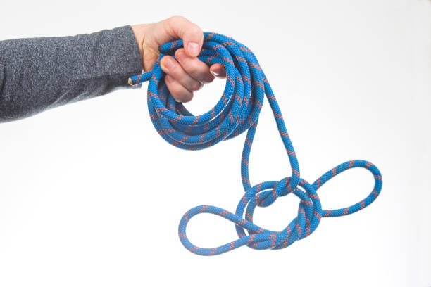 istock hand holds colored rope for climbing equipment. item for camping and climbing 1438199528