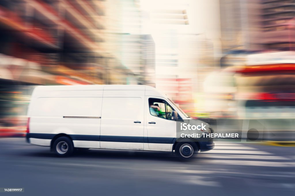 Delivery white van in Manhattan around Times Square area Delivery Van Stock Photo