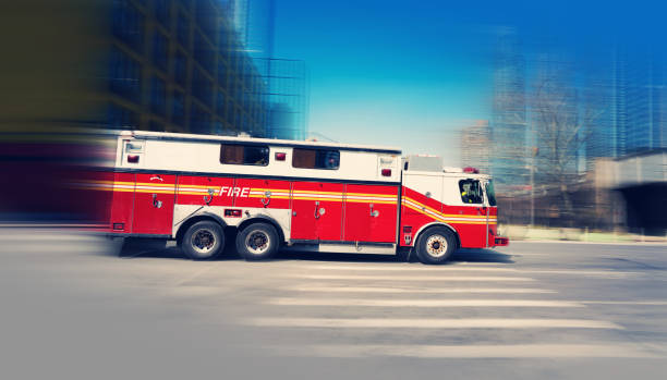 istock Fire engine rushing in New York city 1438200707