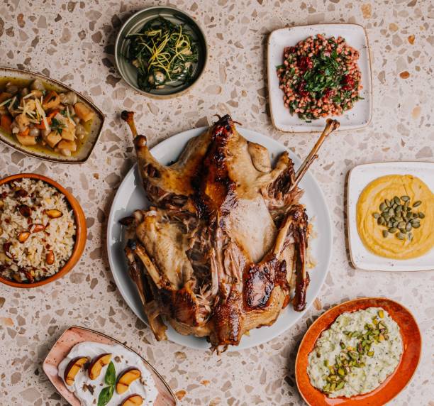 istock Roasted chicken in the center with side dishes around 1438201407