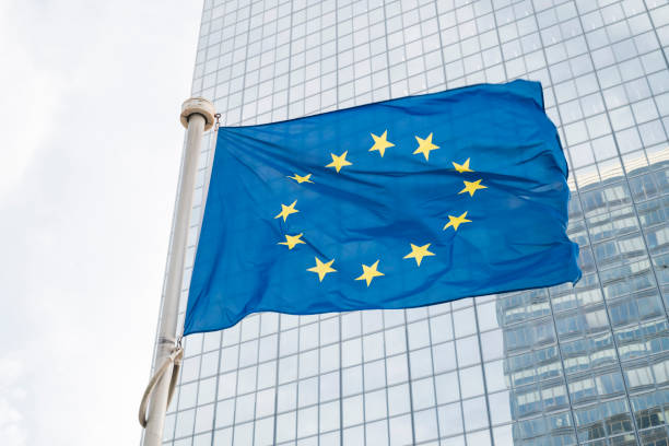 istock EU flag blue on the background of the building 1438202504