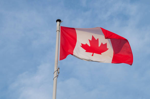 istock flag state canada north america flying against the sky 1438202574