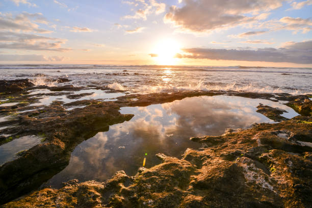 istock The Sun Setting in the Sea 1438208297