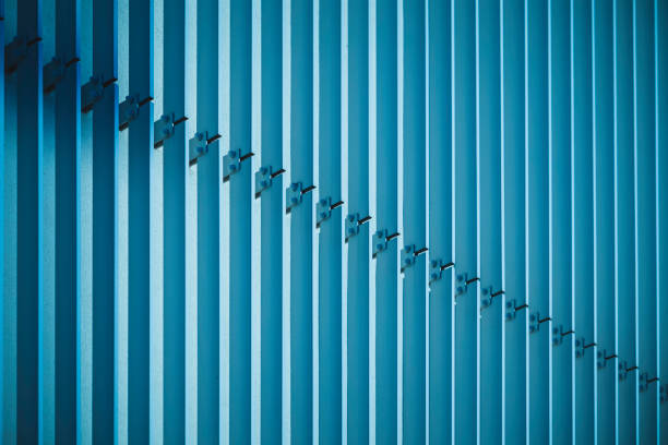 Corner and rooftop of blue colored thai home in Bangkok Ladprao