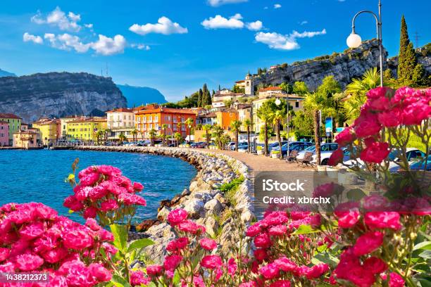 Colorful Town Of Torbole On Lago Di Garda Waterfront View Stock Photo - Download Image Now