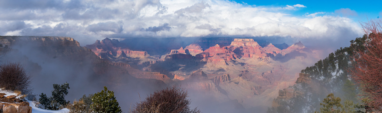 Rays of sunlight across the morning fog in  Grand Canyon, Arizona from the South Rim