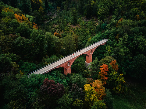 Railway viaduct in Srebrna gora at autumn season. Poland landmark for tourists. Beautiful nature landscape