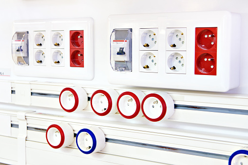 an electric socket, is a device that functions as a connector for electricity